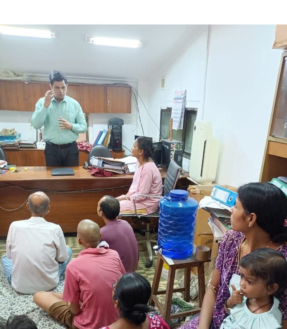 image with teaching staff and students